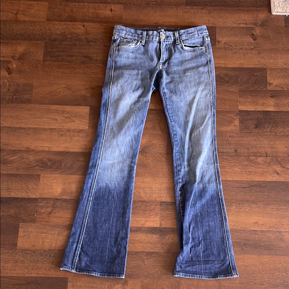 7 For All Mankind Blue Flare Jeans with Distressed Details